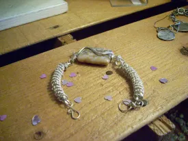 Wire bracelet with brown natural stone